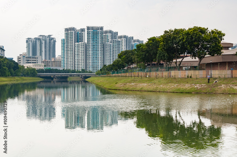 typical Singapore highrise public housing estate with river in f