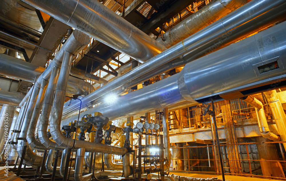 Equipment, cables and piping as found inside of a modern industr Equipment, cables and piping as found inside of a modern industr