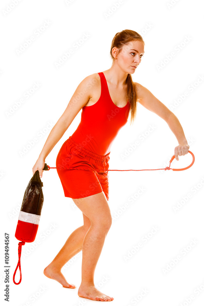 Lifeguard on duty with rescue torpedo buoy. Lifeguard on duty with rescue torpedo buoy.
