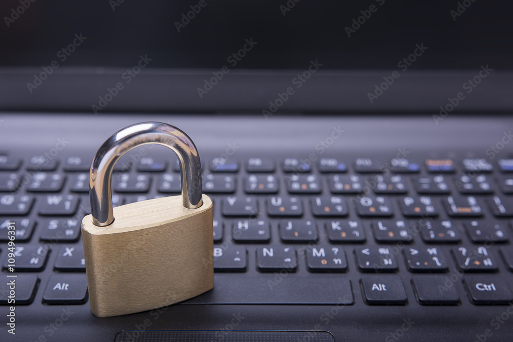 security lock on computer - computer security concept - selective focus security lock on computer - computer security concept - selective focus
