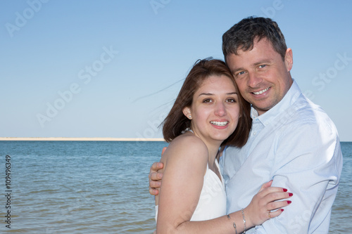 Romantic and lovely couple on the beach