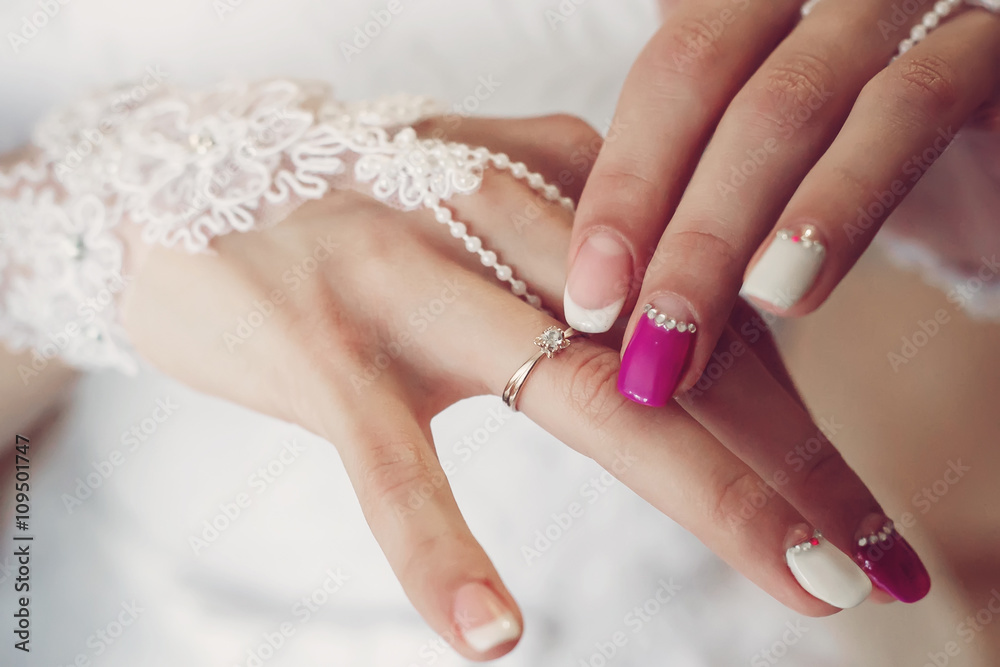 Wedding. diamond ring on the finger.  Beautiful manicure. Proposal for married. wedding  manicure, soft selective focus. gorgeous young bride at home. series.