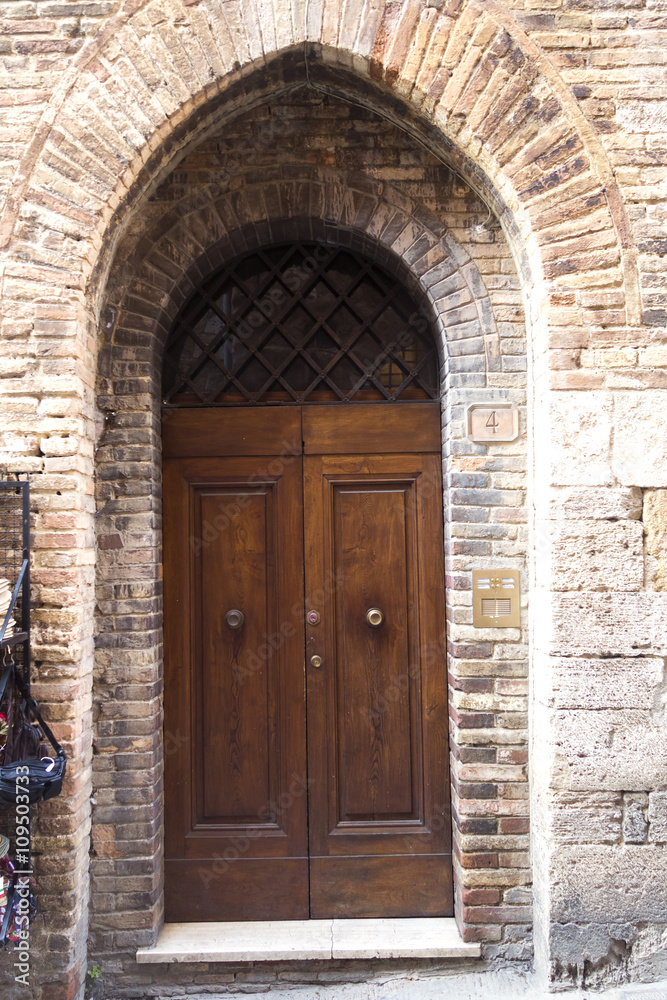 old door in San Gimignano, Tuscany. Italy