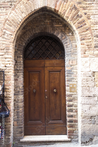 old door in San Gimignano, Tuscany. Italy
