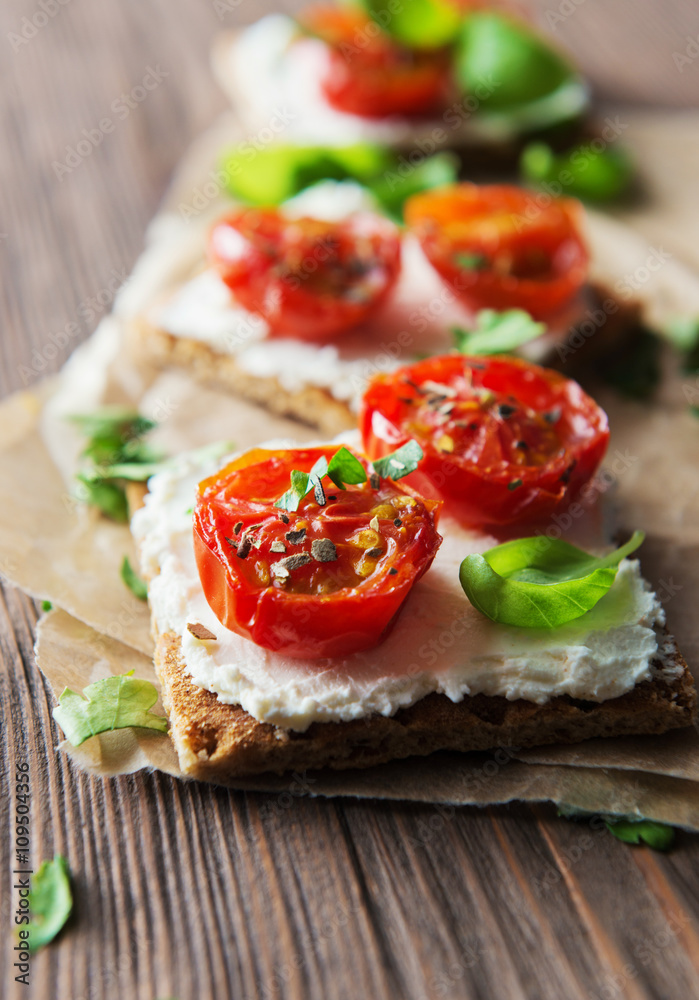 Toasts (Crostini) with ricotta and cherry tomatoes