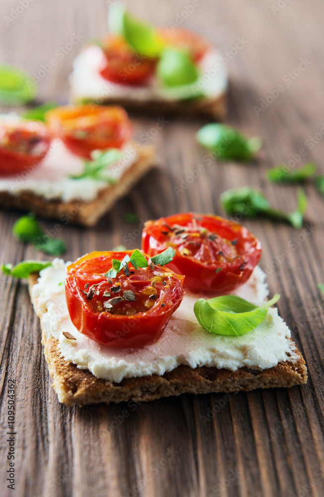 Toasts (Crostini) with ricotta and cherry tomatoes Toasts (Crostini) with ricotta and cherry tomatoes