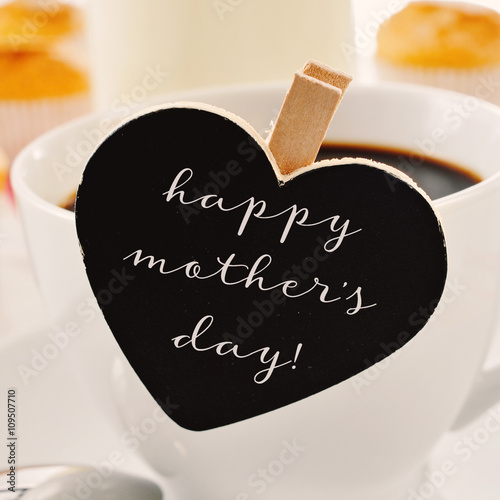 breakfast and text happy mothers day in a heart-shaped blackboar
