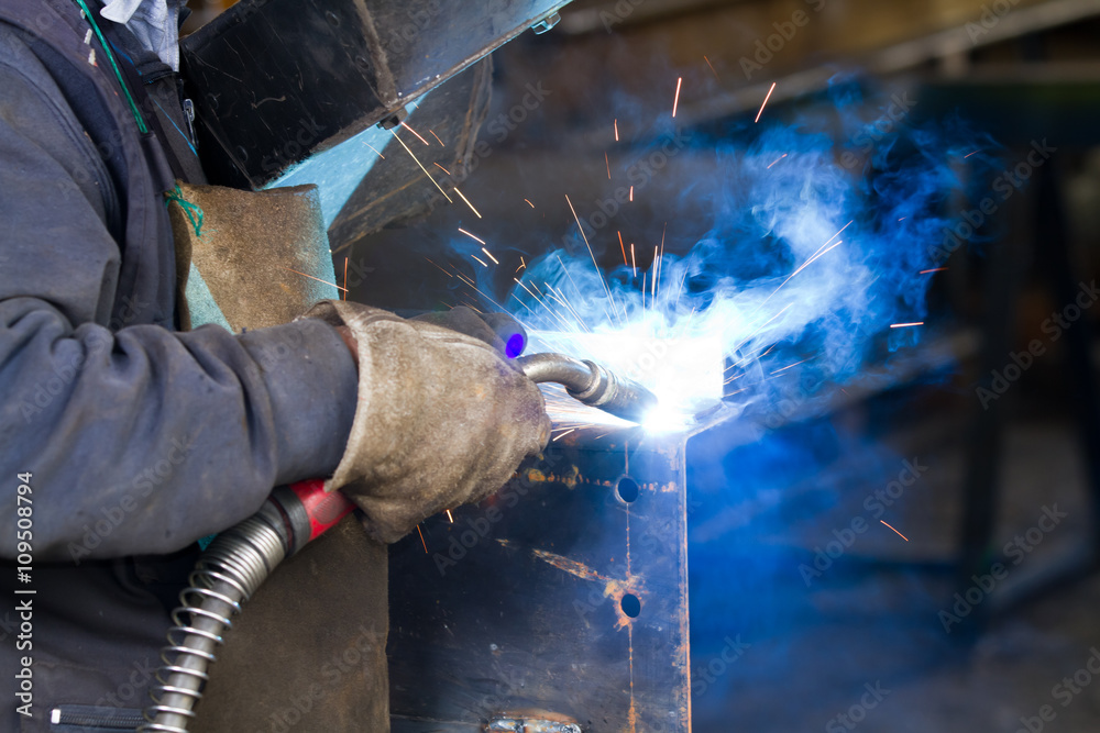 metalworker at work in his workshop metalworker at work in his workshop