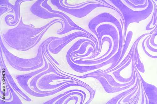 Vintage marbling paper in traditional Turkish style, ebru on highly textured paper or cloth. Purple and white colors. 