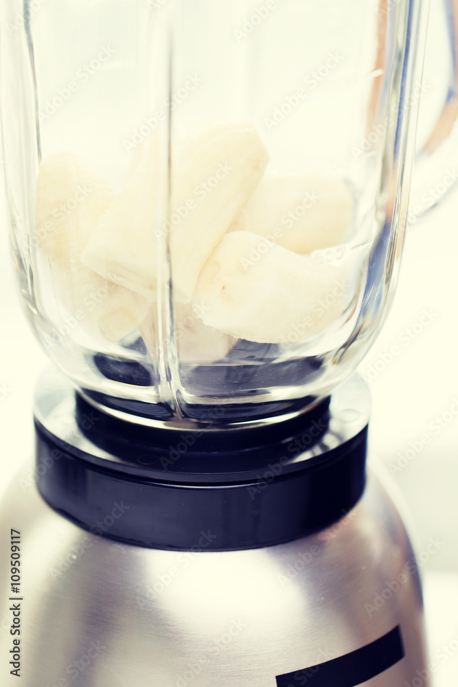 close up of blender shaker with bananas close up of blender shaker with bananas