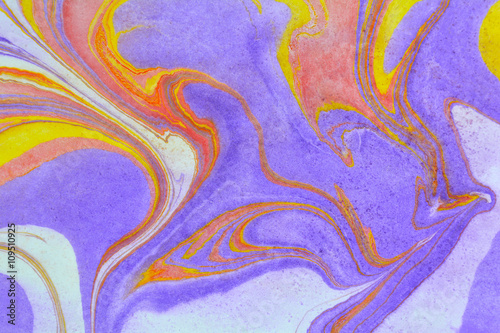Abstract background. Ink marbling texture. Purple yellow, red and white. Hand drawn marble illustration, ebru aqua paper and silk print. Traditional Turkish ebru technique. Painting on water. 