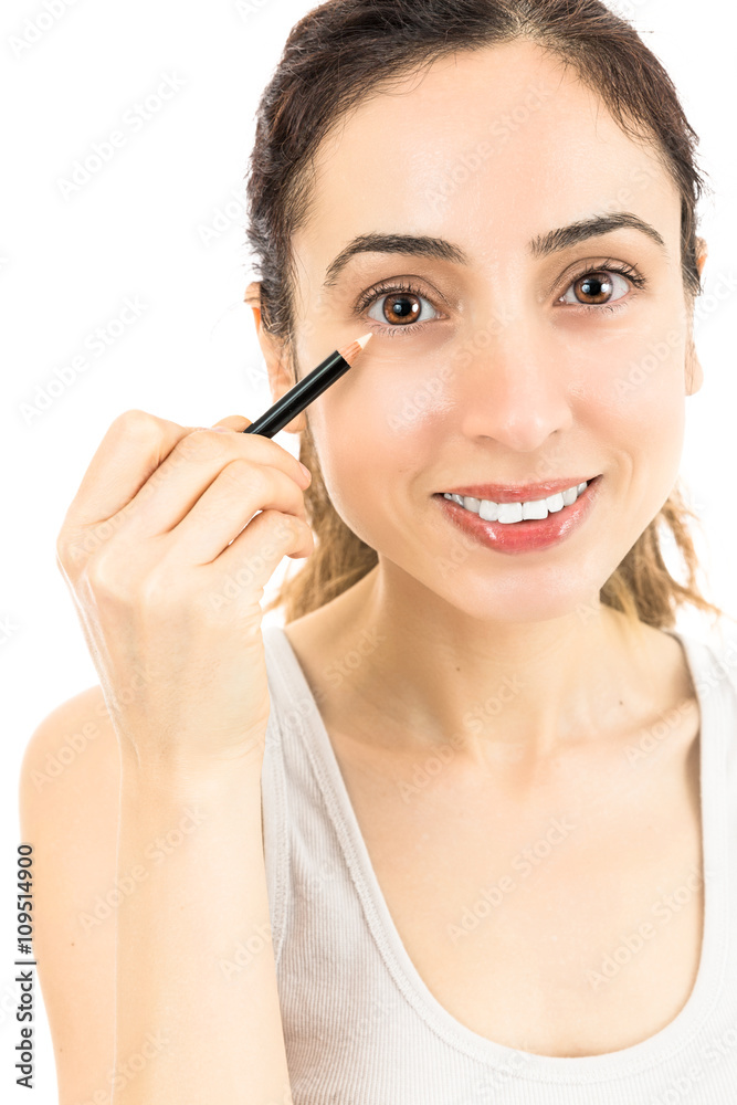 Beautiful caucasian woman using eyeliner Beautiful caucasian woman using eyeliner