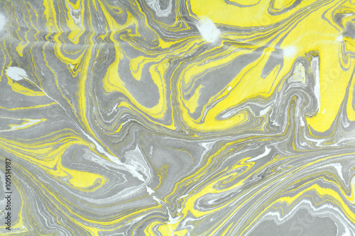 Marbling style. Writing surface, endpapers in bookbinding and stationery. Abstract handmade marble background. Ebru, traditional Turkish painting art. Painting on water. Transferred painting on paper.