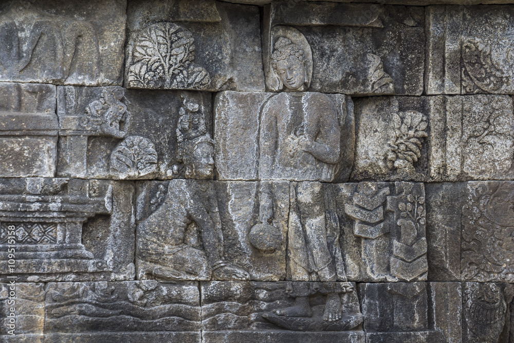 Ancient stone reliefs in Borobudur temple