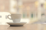 coffee cup on wooden table ,soft focus