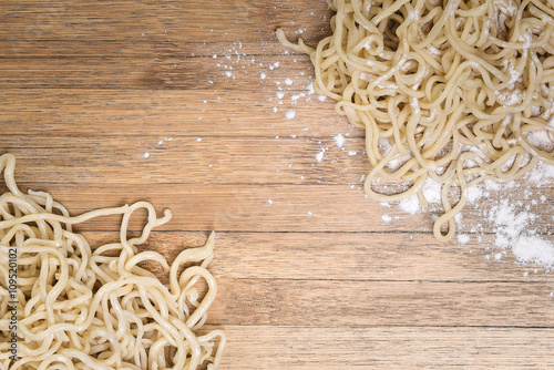 ramen, chinese vermicelli on wooden background