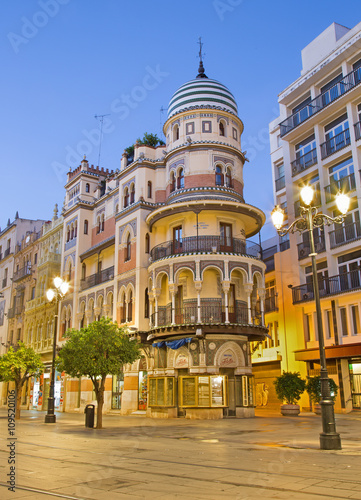 SEVILLE, SPAIN - OCTOBER 29, 2014: The building in the neo-mudejar style on Avenida de la Constitucion street in morning dusk.