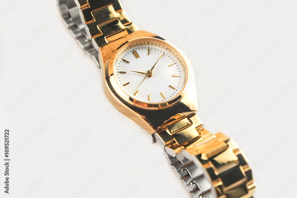 selective focus luxury gold women wrist watch on white background selective focus luxury gold women wrist watch on white background