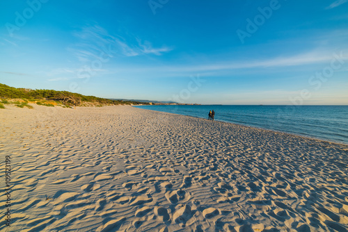 walking on the beach at sunset