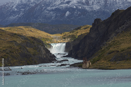 Waterfall Salto Grande connecting Lago Nordenskjoldin and Lago Pehoe in Torres del Paine National Park, Magallanes, Chile photo