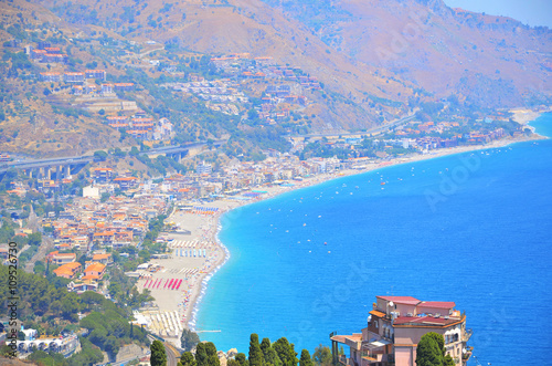 Spisone beach viewed from Taormina, Sicily, Italy photo