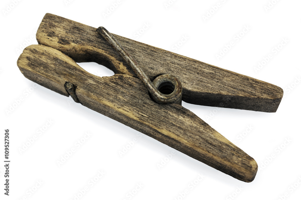 Decrepit wooden clothespin on a white background Decrepit wooden clothespin on a white background