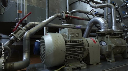 Row of tanks in microbrewery
