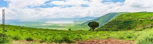 panorama view of the Ngorongora Crater with grassland and  lakes
 photo