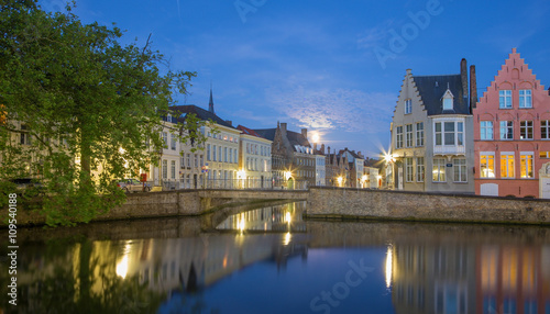 Bruges - Canal and st. Annarei and Verversdijk streets in evening dusk. © Renáta Sedmáková