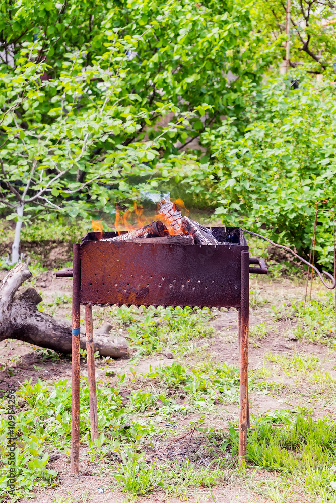 burning flame fire in the brazier on the nature. burning flame fire in the brazier on the nature.