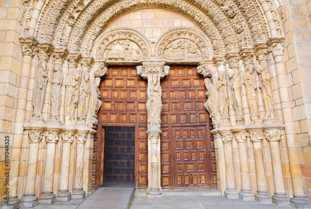 AVILA, SPAIN, APRIL - 19, 2016: The romanesque west portal of Basilica de San Vicente with the apostles. (1130).