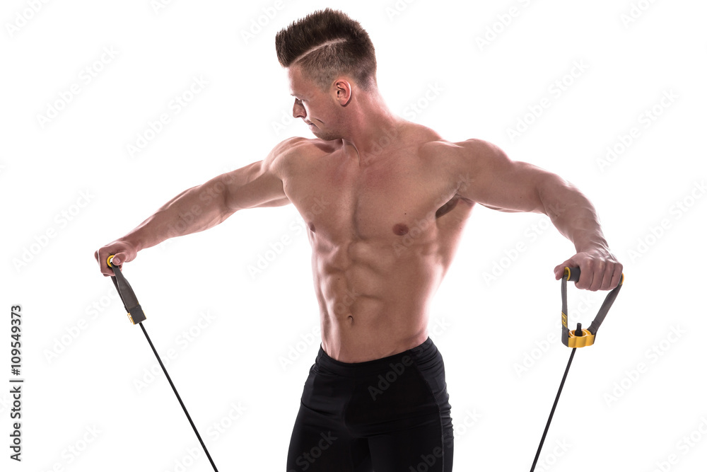 Bodybuilder working out with rubber band over white background Bodybuilder working out with rubber band over white background