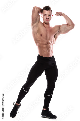 Young bodybuilder showing his muscles