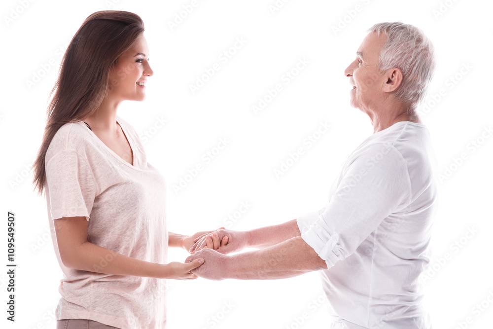 A Happy elderly man and his beautiful daughter A Happy elderly man and his beautiful daughter