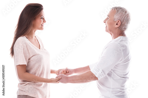 A Happy elderly man and his beautiful daughter