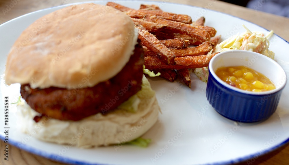 Vegetable burger with sweet potato fries Vegetable burger with sweet potato fries
