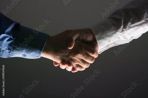 Handshake Handshaking in dark with low light