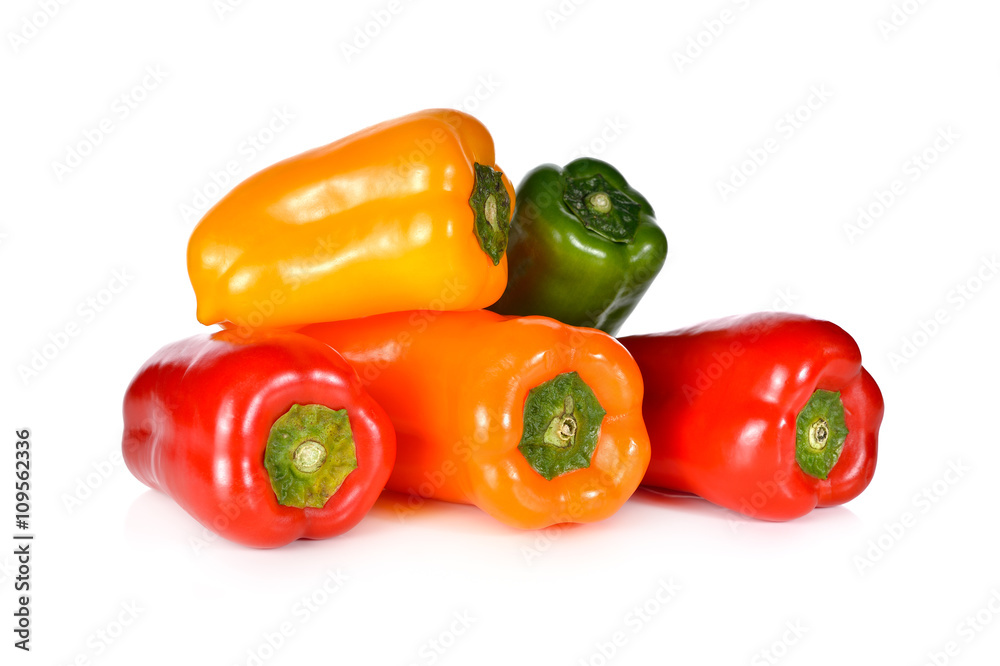 stack of fresh Aura sweet red, yellow, green, orange pepper on w stack of fresh Aura sweet red, yellow, green, orange pepper on w