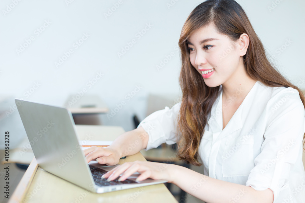 young beautiful asian girl student in classroom young beautiful asian girl student in classroom
