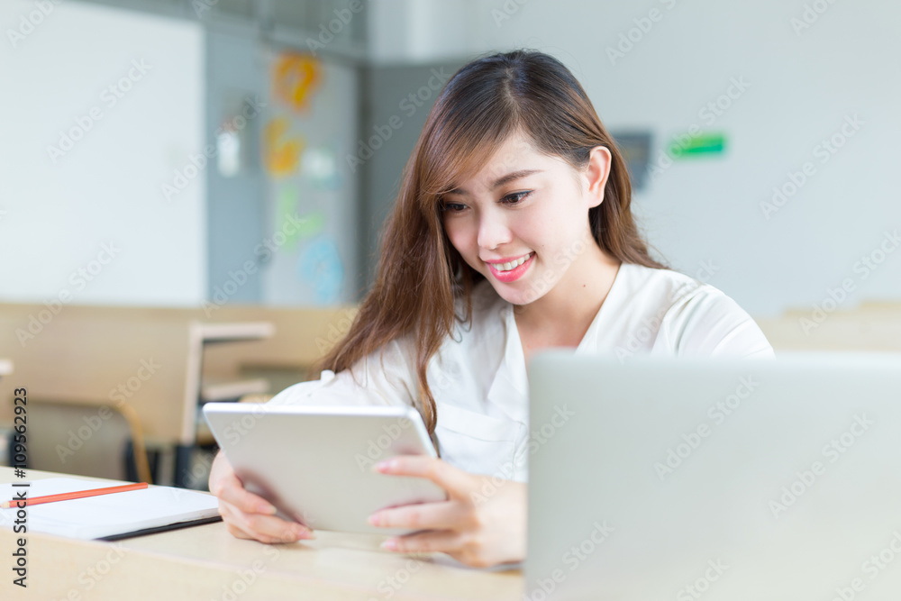 young beautiful asian girl student in classroom young beautiful asian girl student in classroom