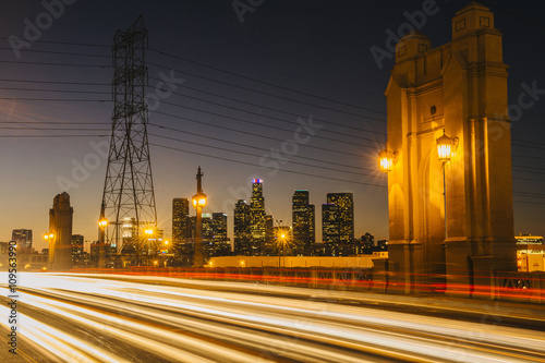 Light trails of traffic crossing 4th street bridge, illuminated at night, Los Angeles, California, USA photo