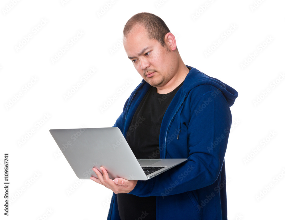 Middle aged man with laptop computer Middle aged man with laptop computer