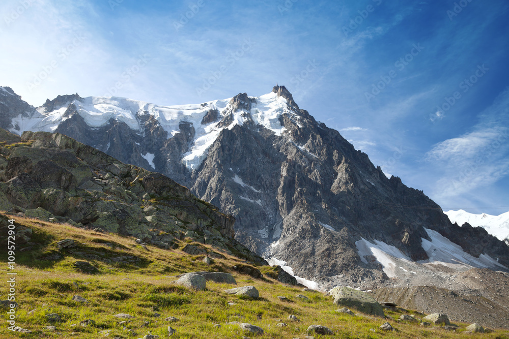 summer view of Aiguille du Midi peak in Mont Blanc massif