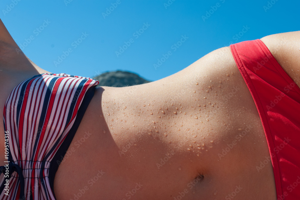 Fototapeta premium The young girl with a beautiful body