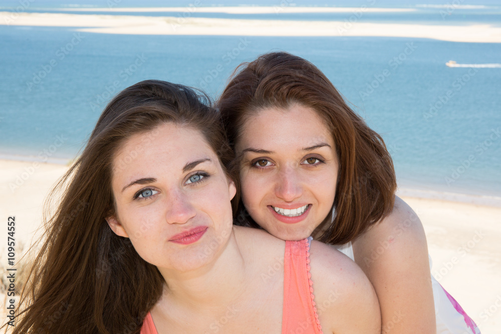 Happy summer vacation - summer woman portrait at beach having fun Happy summer vacation - summer woman portrait at beach having fun