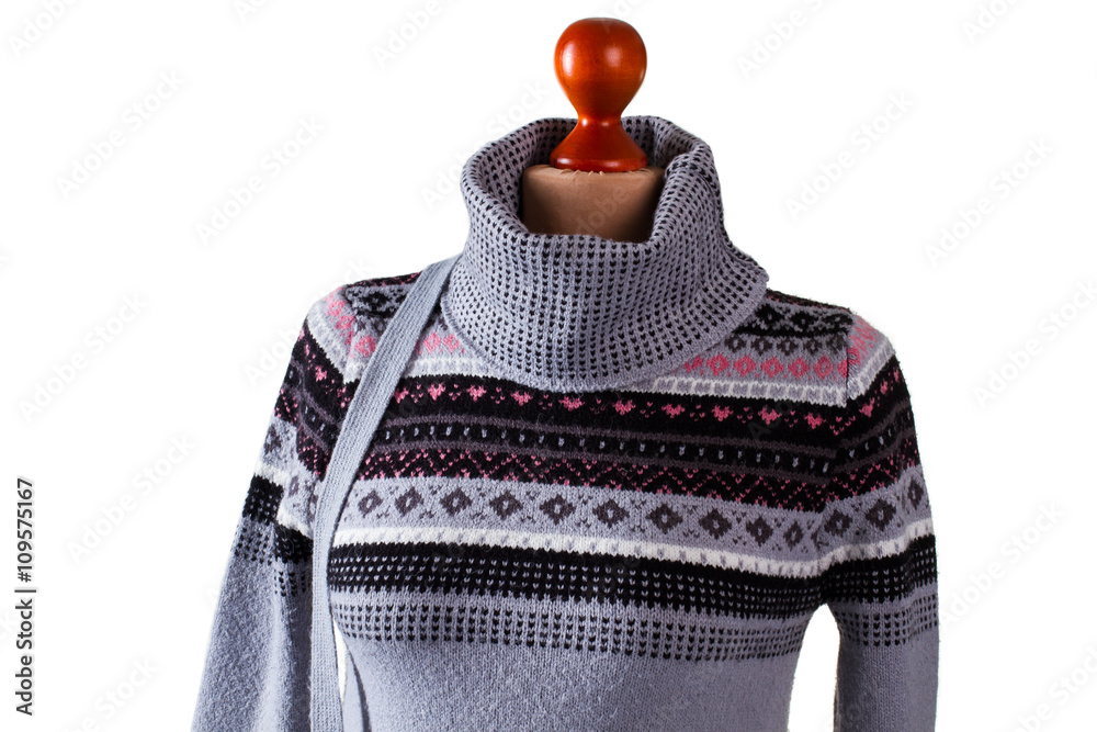 Warm gray high collar sweater. Warm sweatshirt on headless mannequin.  Stylish handmade pullover in workshop. Lady's custom made woolen garment.  Stock-Foto | Adobe Stock