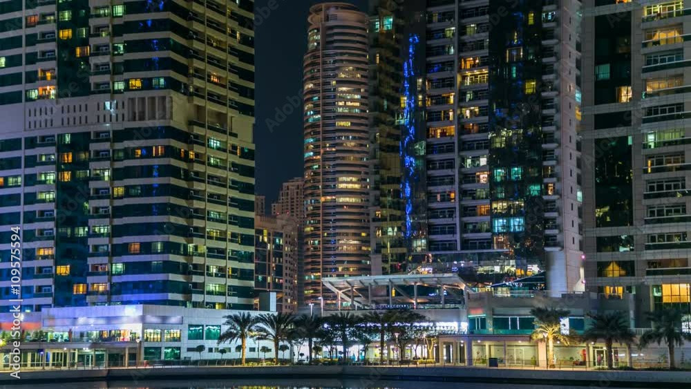 Residential buildings in Jumeirah Lake Towers timelapse in Dubai, UAE. Residential buildings in Jumeirah Lake Towers timelapse in Dubai, UAE.