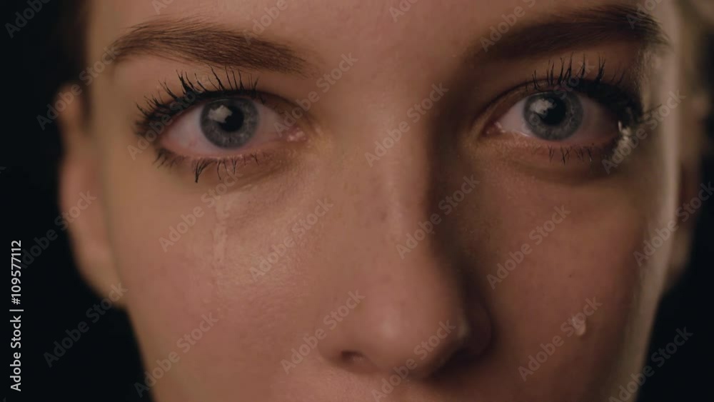 Closeup view of face of SAD Young Woman Crying and having problems with private life. Girl in depression because of home violence. She is disappointed. Tears on face. ideal for social ads. 4K video Closeup view of face of SAD Young Woman Crying and having problems with private life. Girl in depression because of home violence. She is disappointed. Tears on face. ideal for social ads. 4K video