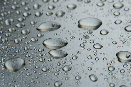 Water drops on the metal closeup