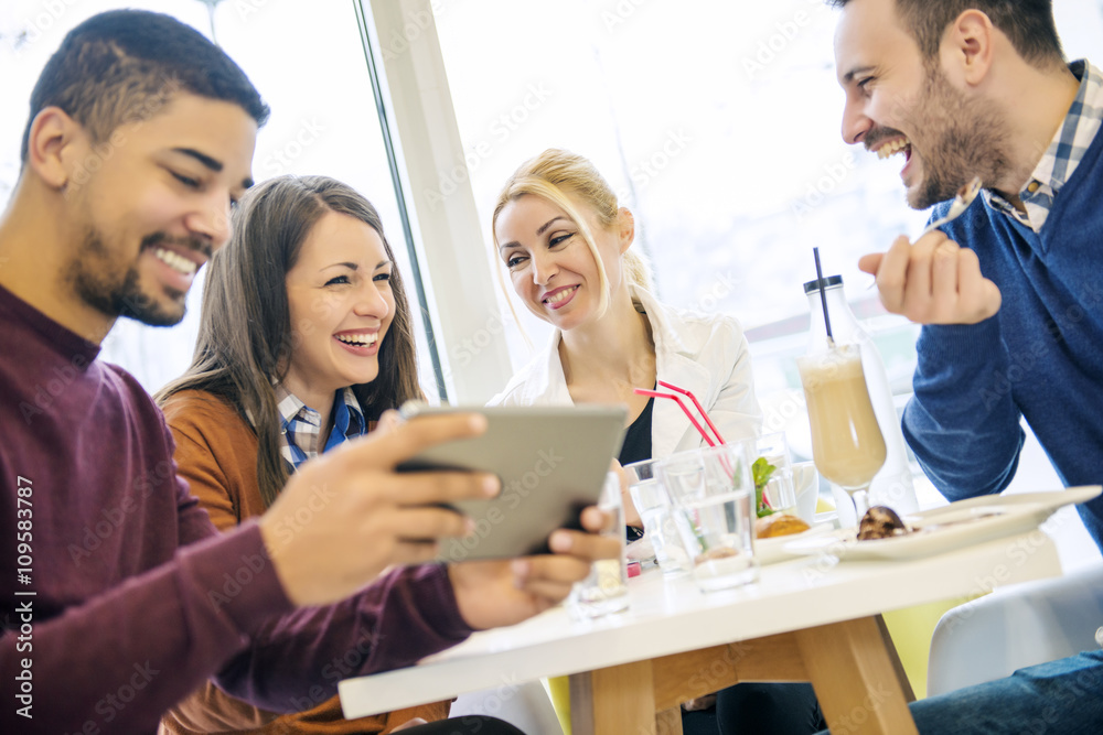 Friends having a great time in cafe
